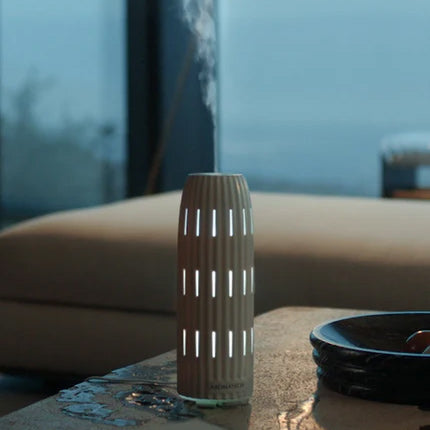 Close-up of 168极速赛车官方开奖平台essential oil bottles labeled 'Santal,' 'Santal Night,' and 'Santal Escape'